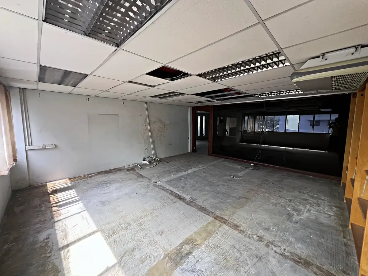 Ceiling tiles removed to check the void above, the quickest way to find a hidden factory extension or mezzanine floor